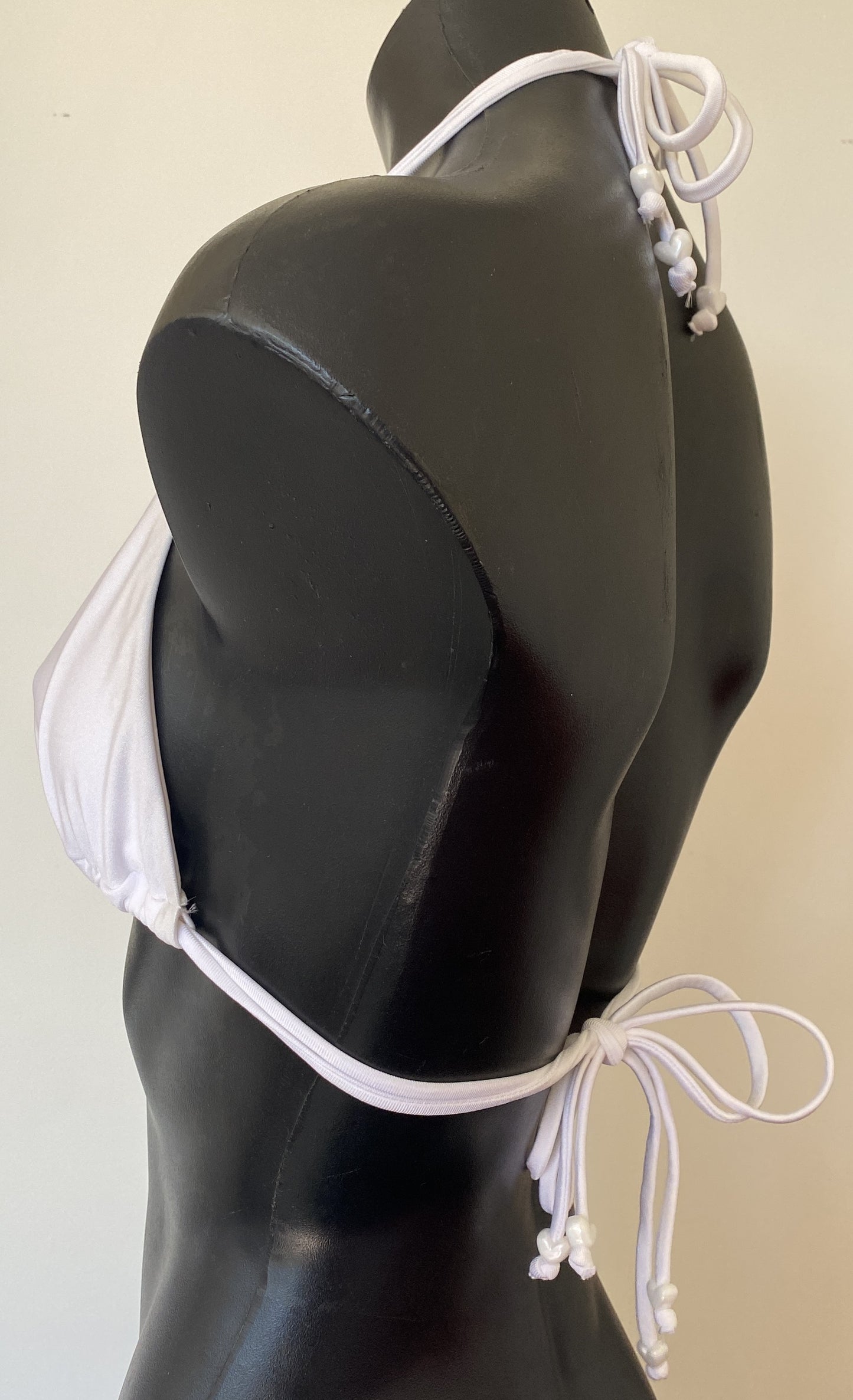 MissManeater WHITE Reef Knot sliding triangle bikini top angled front detail on mannequin