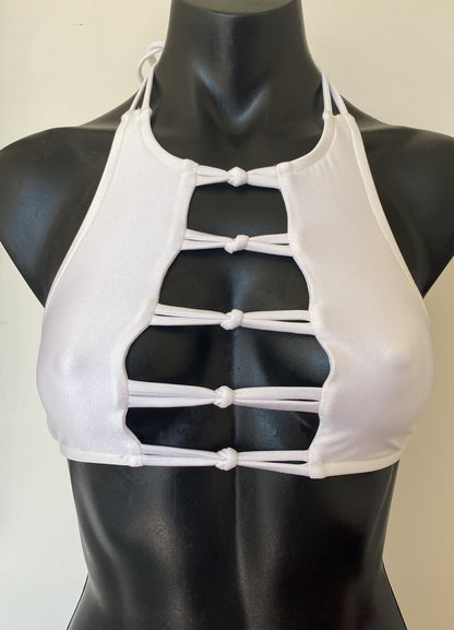 Front torso view of the Miss Maneater white fixed strap boutique bikini crop top showing signature reef knot front detailing.
