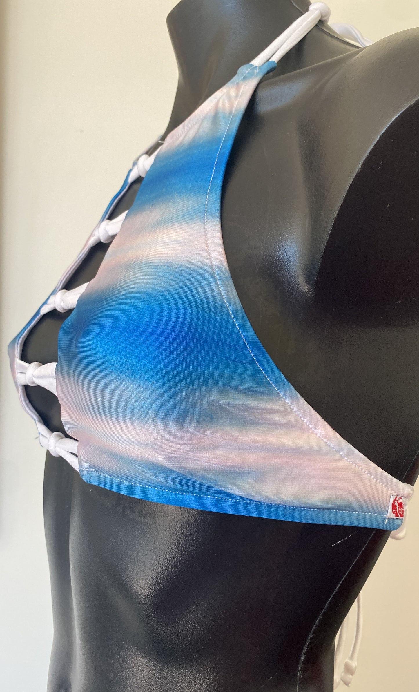 Detail of MissManeater SHARKskin digital print on boutique bikini crop top