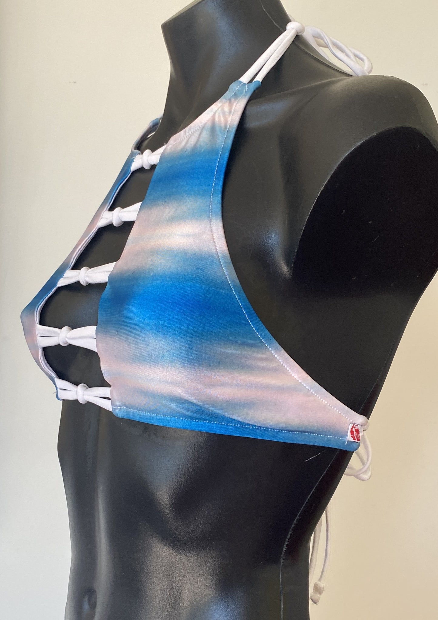 Side view of MissManeater SHARKskin boutique bikini crop top showing halter strap design
