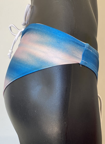 Side view of MissManeater SHARKskin bikini pant showing smooth fit and Brazilian cheeky coverage, Australian made designer swimwear