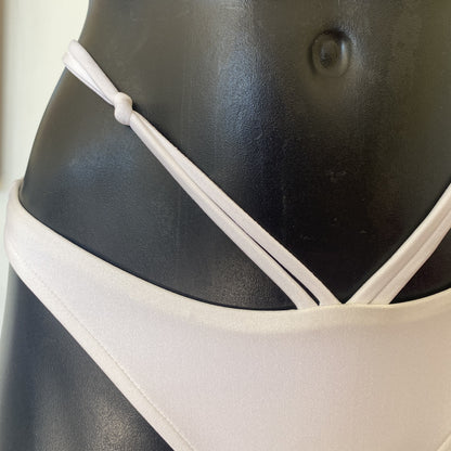 MissManeater white reefknot bikini pant close up showing double strap detail and knot feature Australian made designer swimwear
