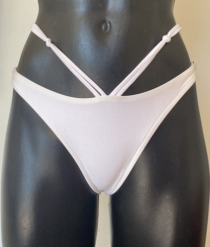 MissManeater white reefknot high cut bikini pant front detail showing strap design and Brazilian cut Australian made designer swimwear